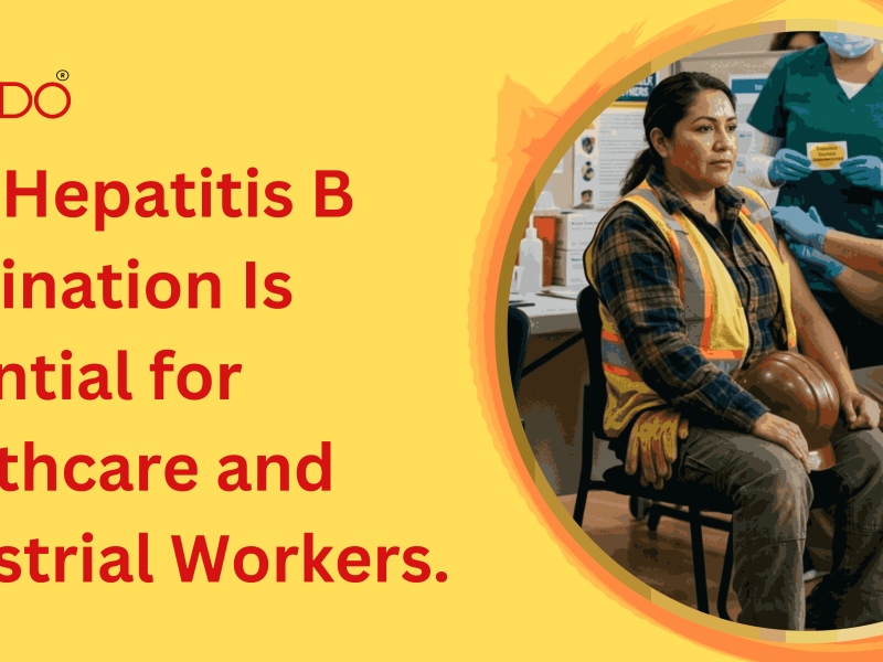 Healthcare professional administering a Hepatitis B vaccine to an industrial worker during a corporate onsite vaccination drive.