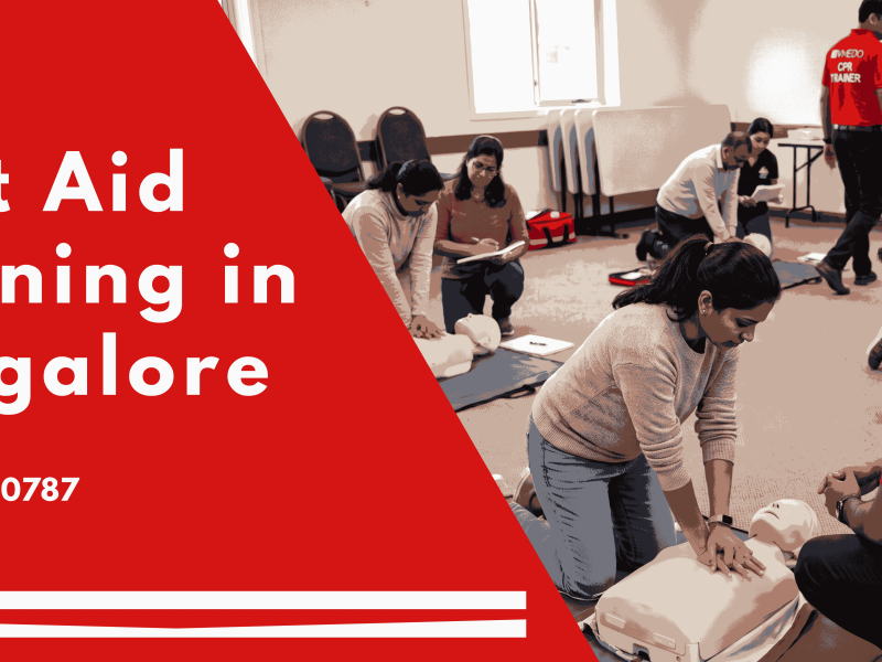 Trainer teaching CPR to a group of people